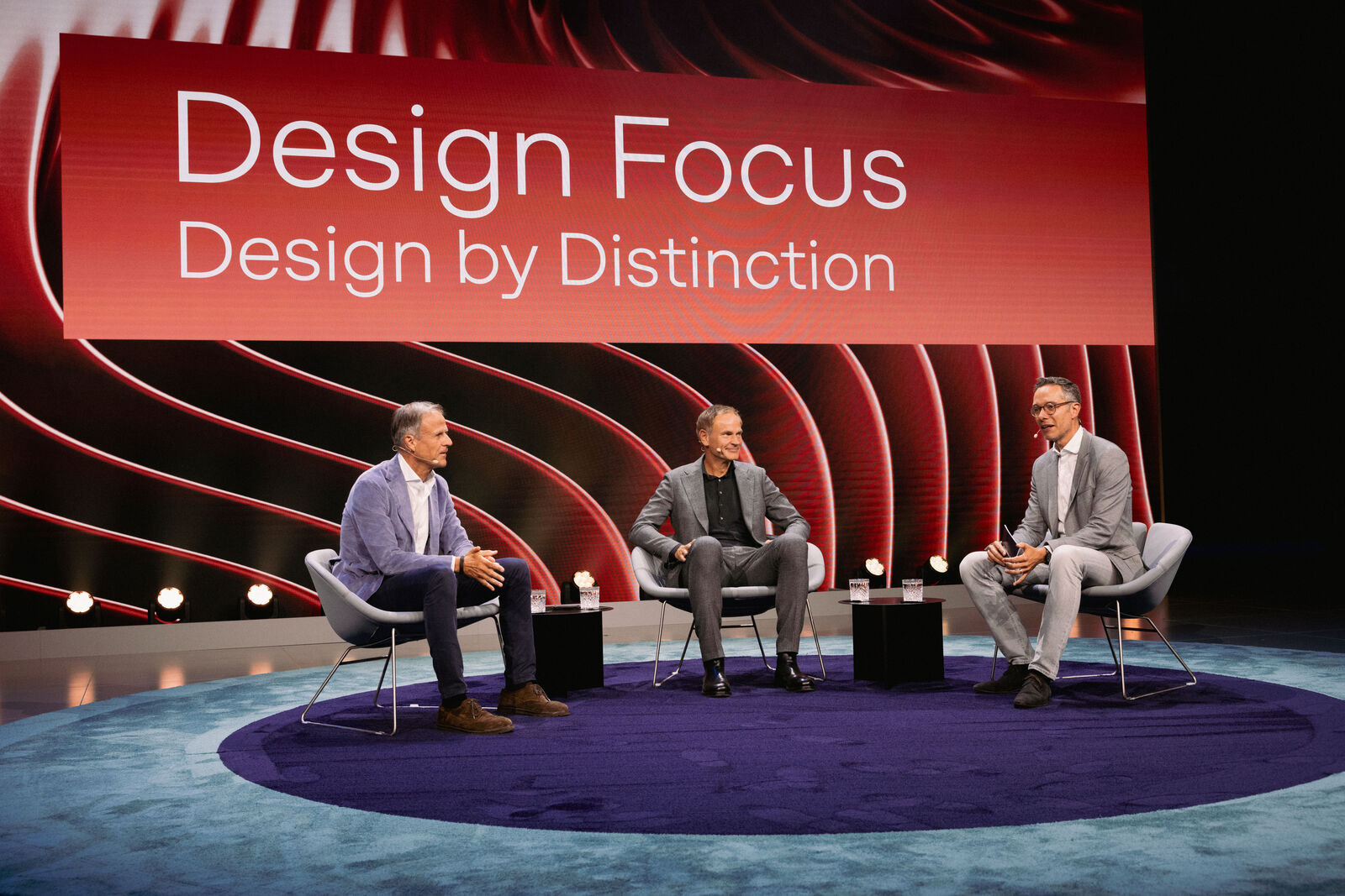 Michael Mauer, Oliver Blume und Sebastian Rudolph (v.l.n.r.) während des Panel Talk "Design Drives Distinction"