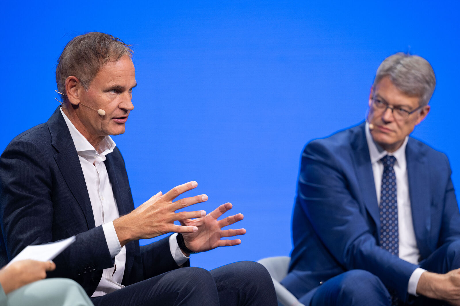 Oliver Blume and Minister of Transport Patrick Schnieder during the panel talk about Autonomous Mobility at the IAA Mobility