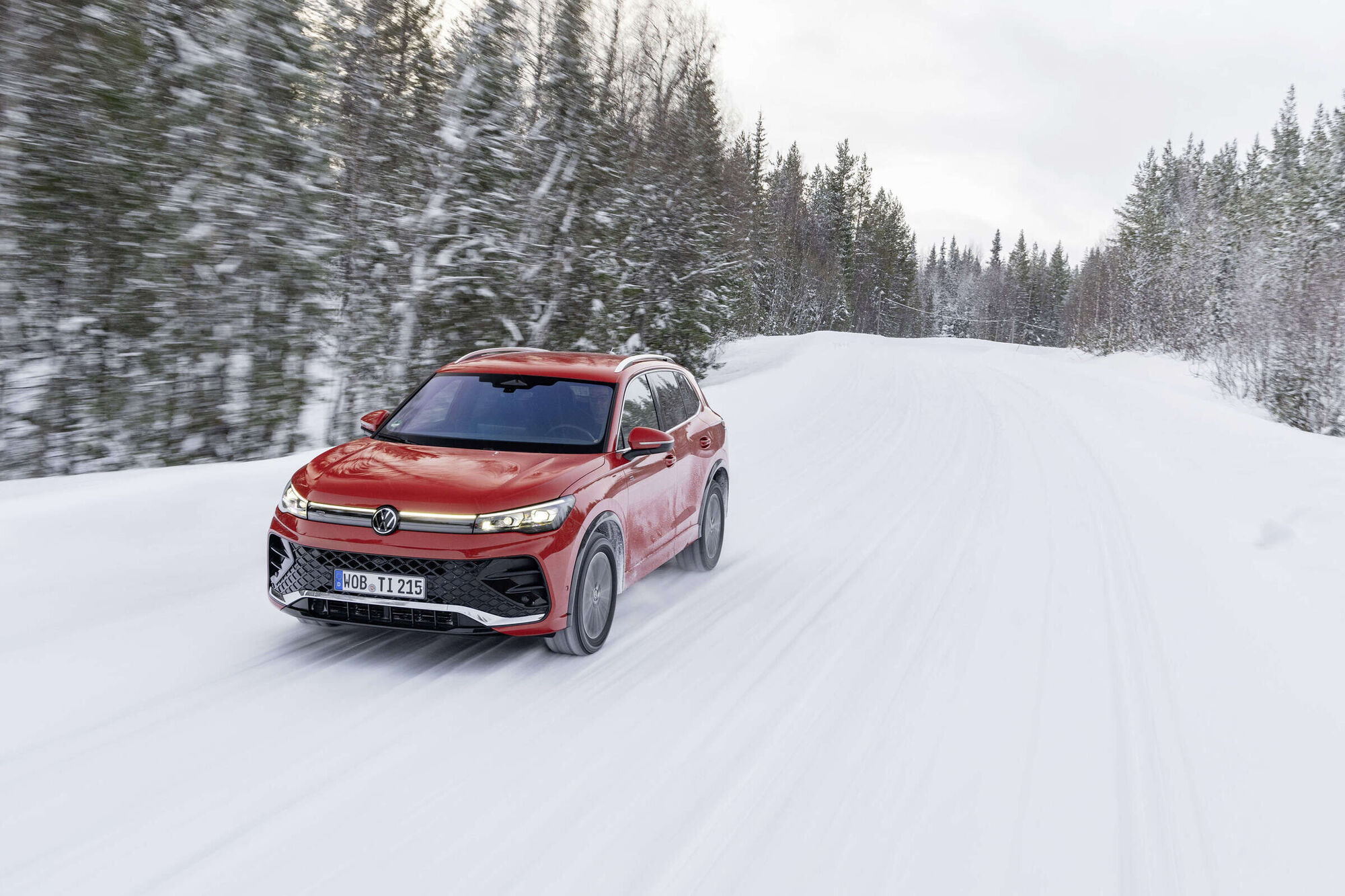 Volkswagen Tiguan driving on a snow-covered road